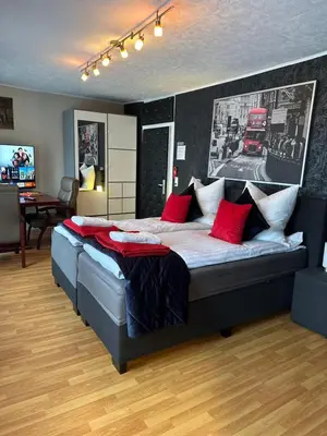 Ein Bett oder Betten in einem Zimmer der Unterkunft Max & Moritz 1 Koblenz
