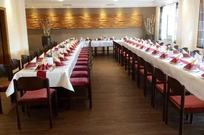 Ein Restaurant oder anderes Speiselokal in der Unterkunft Gasthaus Pension Geimer