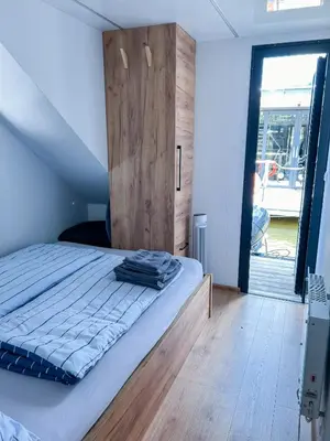 Ein Bett oder Betten in einem Zimmer der Unterkunft Lilly das Hausboot