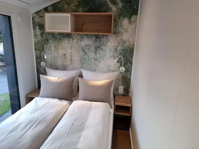 Ein Bett oder Betten in einem Zimmer der Unterkunft LandZeit - get your tiny moments