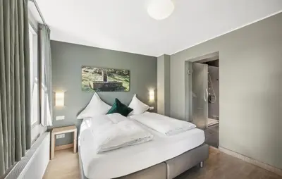 Ein Bett oder Betten in einem Zimmer der Unterkunft Haus Feuerhardt