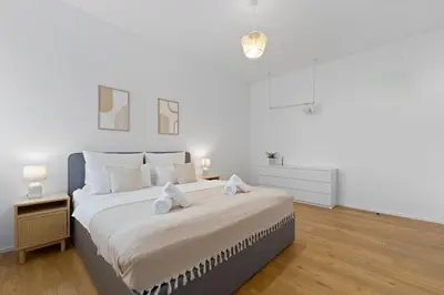 Ein Bett oder Betten in einem Zimmer der Unterkunft Design-Apartments in Top Lage - Familienfreundlich - Küche - Parkplätze - Fahrradstellplätze - Streaming