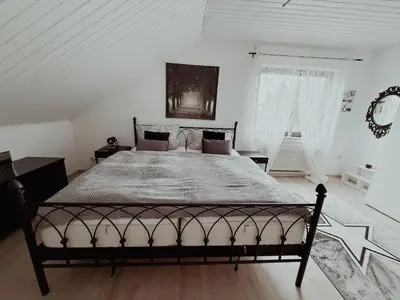 Ein Bett oder Betten in einem Zimmer der Unterkunft Ferienwohnung de Flingou
