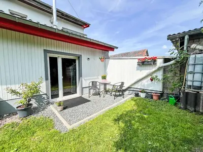 Ein Garten an der Unterkunft Apartment Kleine Wohnung Renata 2 nahe Nürburgring by Interhome