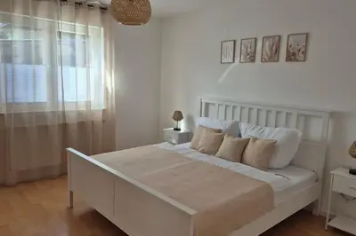 Ein Bett oder Betten in einem Zimmer der Unterkunft Ferienwohnung AU in Bitburg