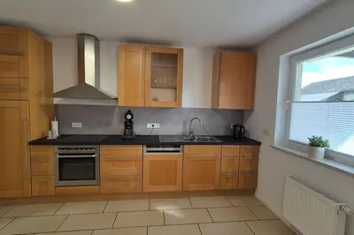Küche/Küchenzeile in der Unterkunft Ferienwohnung AU in Bitburg