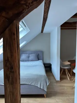 Ein Bett oder Betten in einem Zimmer der Unterkunft Weinblick am Rhein