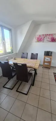 Ein Sitzbereich in der Unterkunft Zum Brückentor