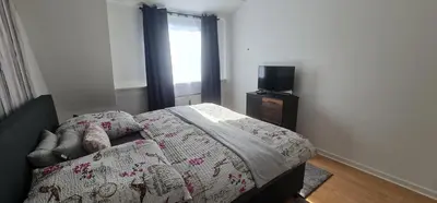 Ein Bett oder Betten in einem Zimmer der Unterkunft Zum Brückentor