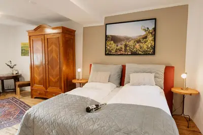 Ein Bett oder Betten in einem Zimmer der Unterkunft Eulenhaus