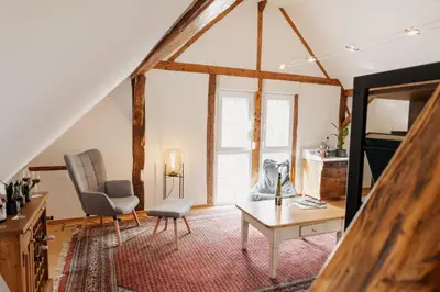 Ein Sitzbereich in der Unterkunft Eulenhaus
