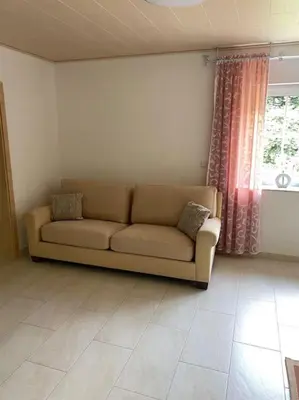 Ein Sitzbereich in der Unterkunft Ferienwohnung Bangert