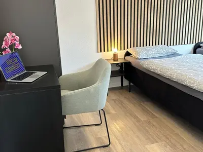 Ein Bett oder Betten in einem Zimmer der Unterkunft Kirchberg Apartments