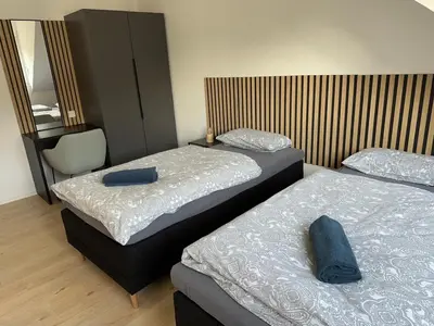 Ein Bett oder Betten in einem Zimmer der Unterkunft Kirchberg Apartments