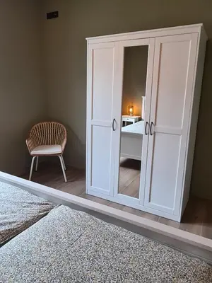 Ein Bett oder Betten in einem Zimmer der Unterkunft Ferienhaus am Berg