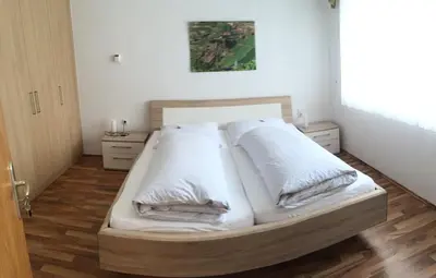 Ein Bett oder Betten in einem Zimmer der Unterkunft Gästehaus Alfons und Maria Anna Eifel