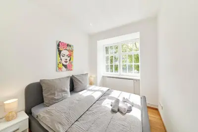 Ein Bett oder Betten in einem Zimmer der Unterkunft Haus Moselufer OG