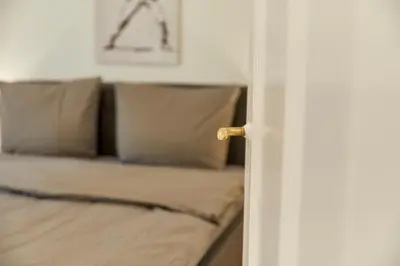 Ein Bett oder Betten in einem Zimmer der Unterkunft Haus Moselufer OG