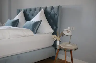 Ein Bett oder Betten in einem Zimmer der Unterkunft Charmantes Chateau Lichter - Burghaus