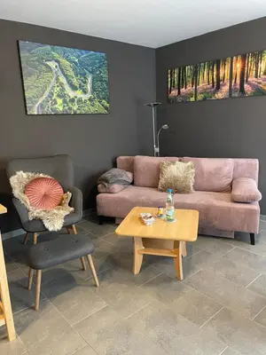 Ein Sitzbereich in der Unterkunft Ferienwohnung Sarah & Thorsten Blum