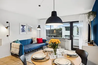 Ein Sitzbereich in der Unterkunft Helle & moderne Wohnung mit Panorama-Balkon