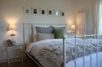 Ein Bett oder Betten in einem Zimmer der Unterkunft Rosenhill B&B