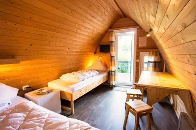 Ein Bett oder Betten in einem Zimmer der Unterkunft Eifel-Camp Freilinger See