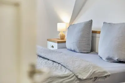 Ein Bett oder Betten in einem Zimmer der Unterkunft Gestade Fewo 4