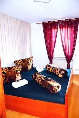 Ein Bett oder Betten in einem Zimmer der Unterkunft Holiday Rhein4