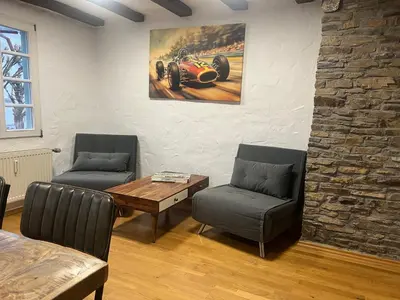 Ein Sitzbereich in der Unterkunft NringRooms am Markt