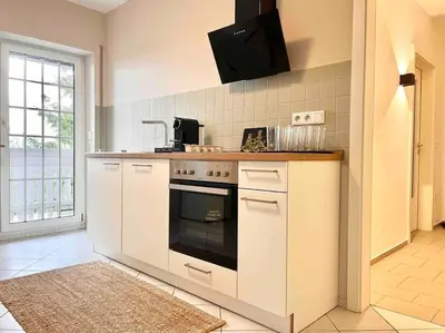 Küche/Küchenzeile in der Unterkunft Reet am Rhein - Obere Hälfte