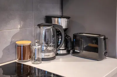Kaffee-/Teezubehör in der Unterkunft Obere Rheinblick-Oase Komfort mit 2 SZ Balkon