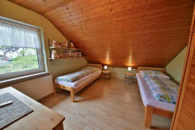 Ein Bett oder Betten in einem Zimmer der Unterkunft Fewo Bleser