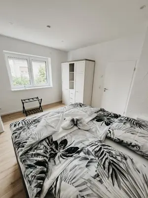 Ein Bett oder Betten in einem Zimmer der Unterkunft Ferienwohnungen Kornkammer und Kirschstübchen