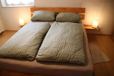 Ein Bett oder Betten in einem Zimmer der Unterkunft FeWo Hotzelche