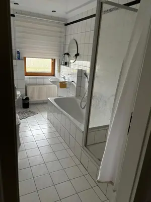 Ein Badezimmer in der Unterkunft Ferienwohnung Monteure Unterkunft