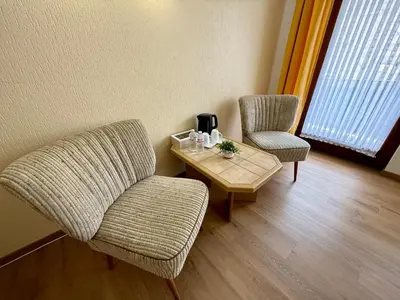 Ein Sitzbereich in der Unterkunft Weinhaus Hirschen Bruttig
