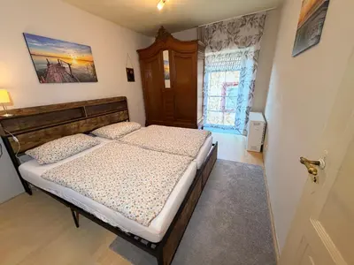 Ein Bett oder Betten in einem Zimmer der Unterkunft Großzügiges Haus in Moselnähe