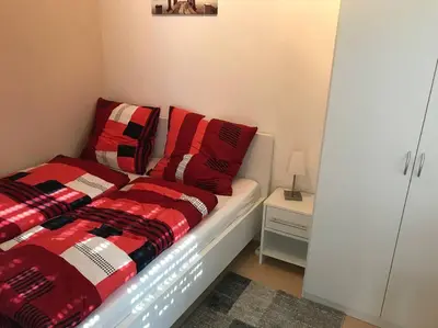 Ein Bett oder Betten in einem Zimmer der Unterkunft KELLer Ferienwohnung