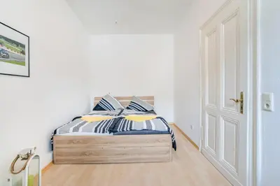Ein Bett oder Betten in einem Zimmer der Unterkunft Nurburgring Rooms Pinocchio