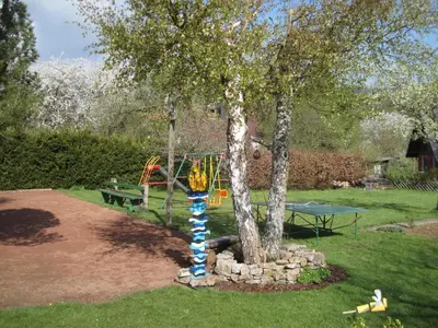 Ein Garten an der Unterkunft Landhaus Müller am Nationalpark Hunsrück-Hochwald