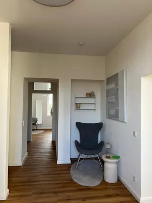 Ein Sitzbereich in der Unterkunft Ferienwohnung Äskulaphof