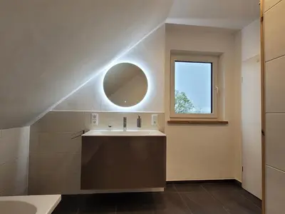 Ein Badezimmer in der Unterkunft Ferienwohnung Weitblick mit Whirlpool