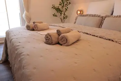 Ein Bett oder Betten in einem Zimmer der Unterkunft Ferienhaus Unter der Burg