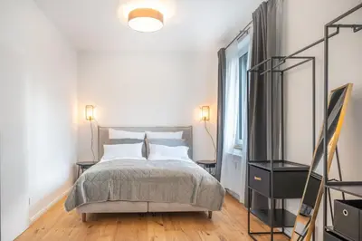 Ein Bett oder Betten in einem Zimmer der Unterkunft Modernes Studio Augusta am Rhein, vollausgestattet, ruhig und verkehrsgünstig gelegen