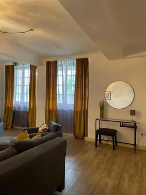 Ein Sitzbereich in der Unterkunft City Apartments Trier Suite 8