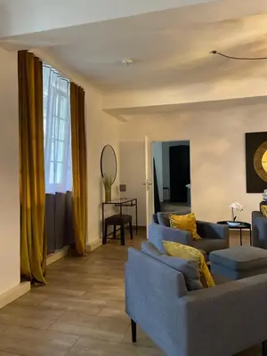 Ein Sitzbereich in der Unterkunft City Apartments Trier Suite 8