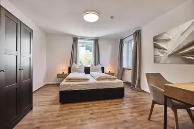 Ein Bett oder Betten in einem Zimmer der Unterkunft Moselträumchen XL