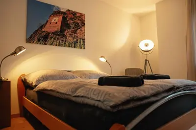 Ein Bett oder Betten in einem Zimmer der Unterkunft Moselblickhaus