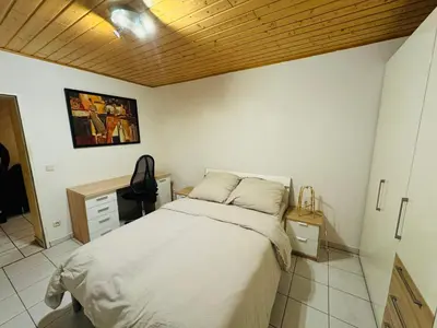 Ein Bett oder Betten in einem Zimmer der Unterkunft Familienzeit Apartament